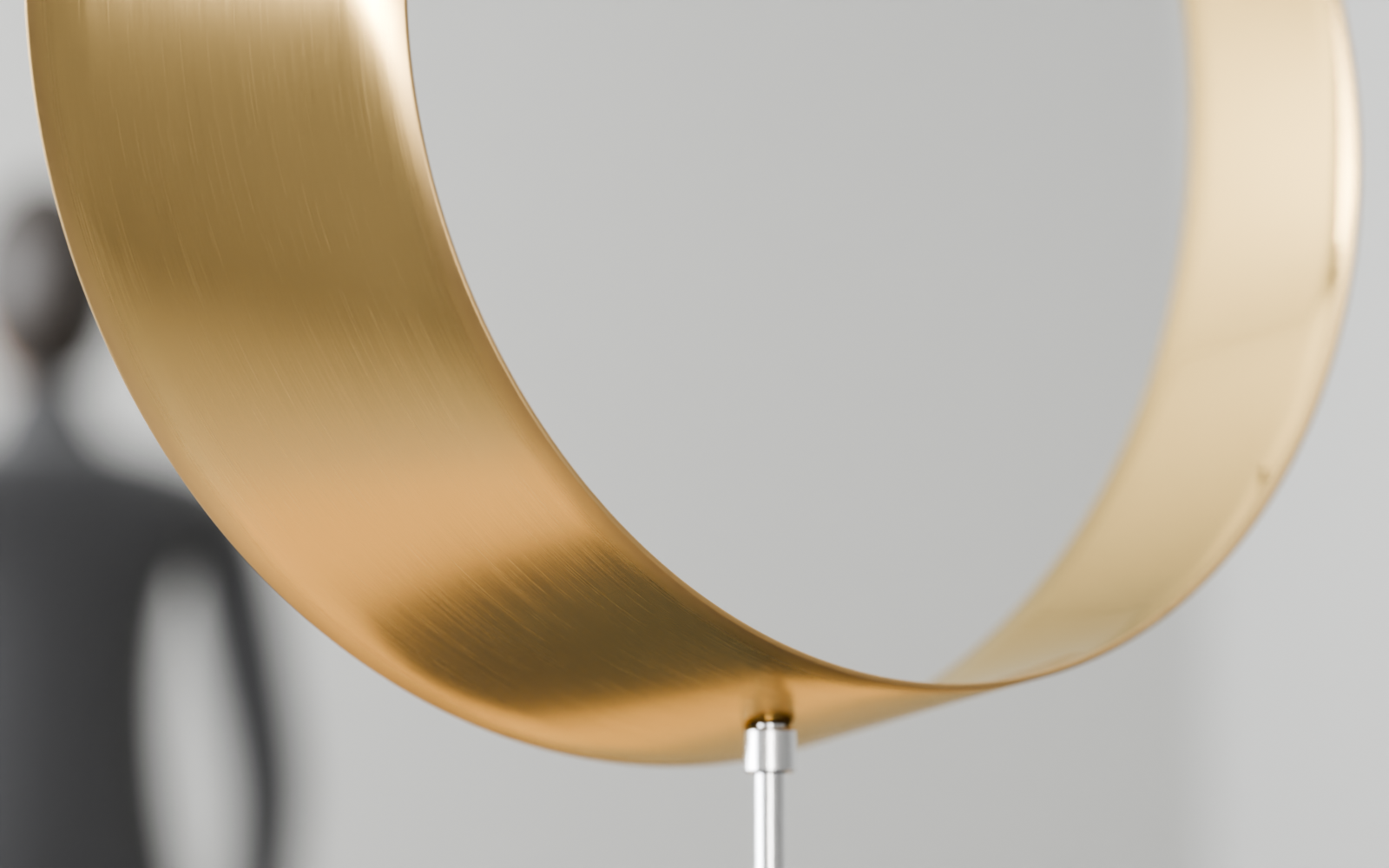 Close detail of the lower fold, mirror inner face and steel spindle.